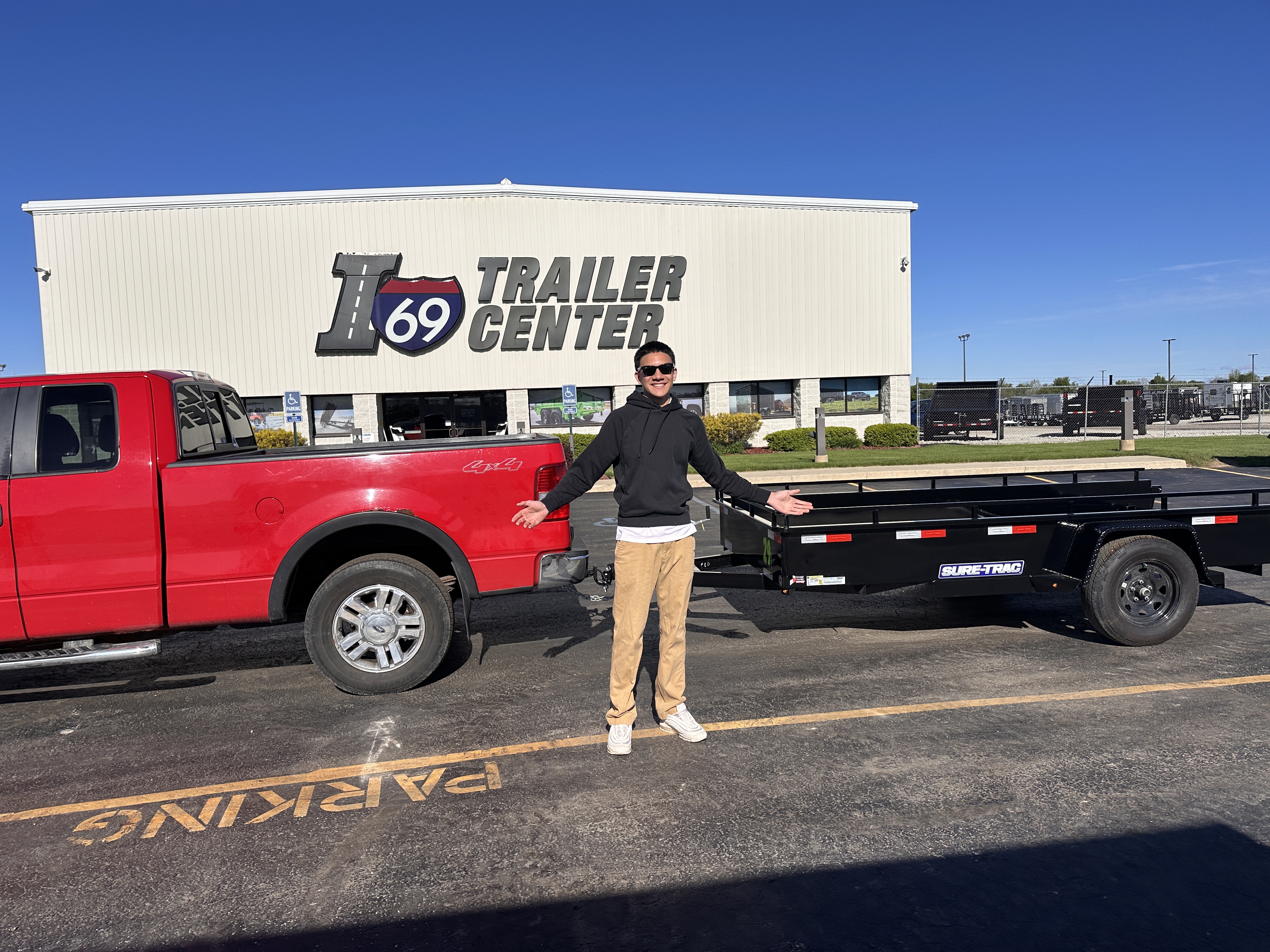 Caleb, founder of Premier Turf Pros, on a job site